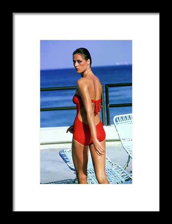 Swimwear Framed Print featuring the photograph Model Wearing A Oleg Cassini Swimsuit #4 by Arthur Elgort