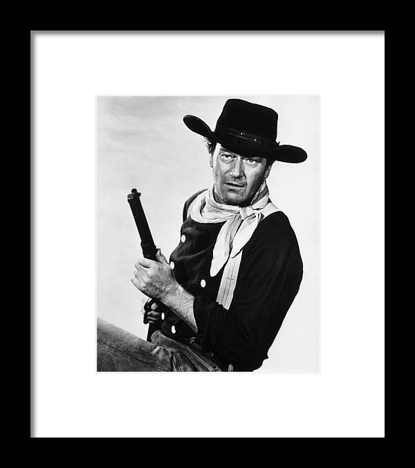John Wayne Framed Print featuring the photograph John Wayne #5 by Silver Screen