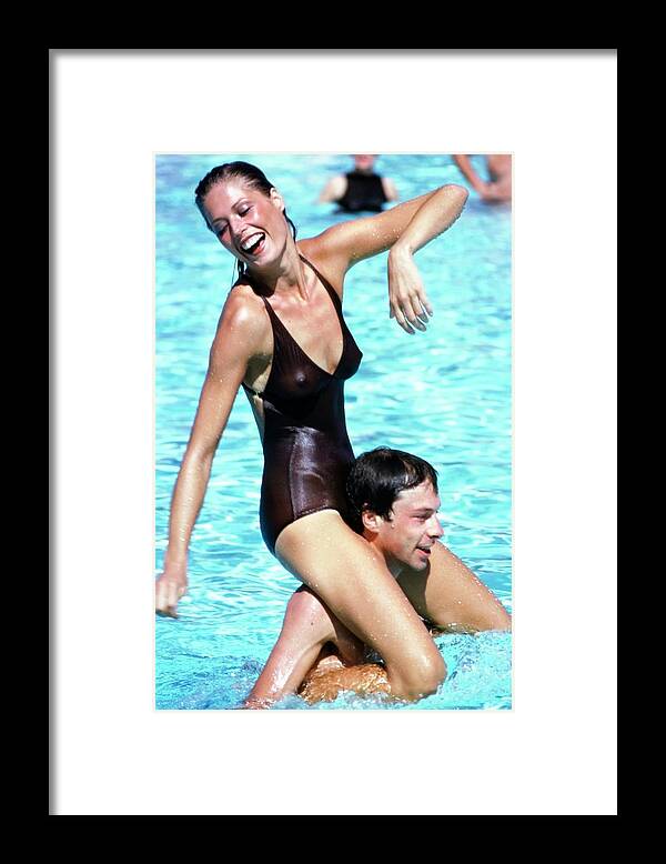 Swimwear Framed Print featuring the photograph Model Wearing A Catalina Swimsuit #5 by Arthur Elgort