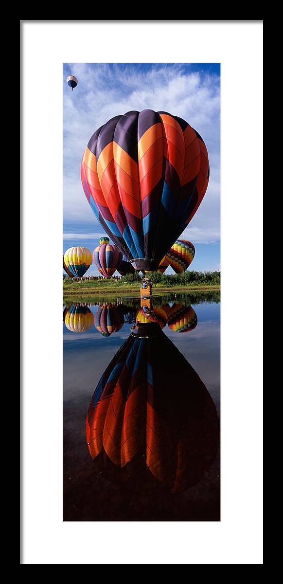 Photography Framed Print featuring the photograph Reflection Of Hot Air Balloons #6 by Panoramic Images