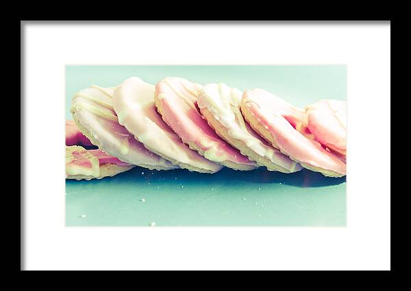 Background Framed Print featuring the photograph Pink cookies #7 by Tom Gowanlock