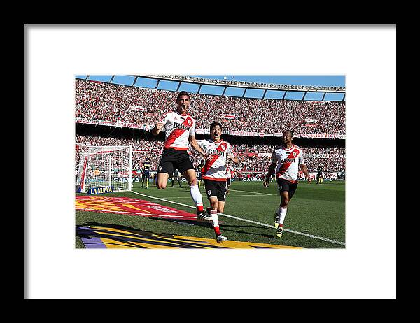 Scoring Framed Print featuring the photograph River Plate v Boca Juniors - Argentine Primera Division #8 by Chris Brunskill Ltd