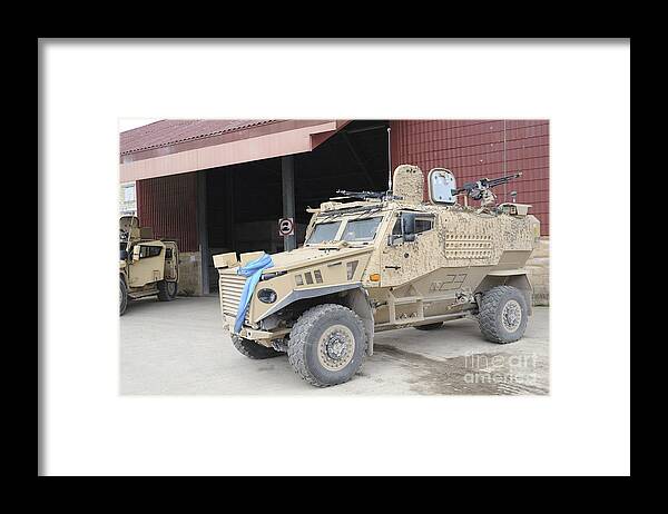 Foxhound Framed Print featuring the photograph A British Force Protection Ocelot by Andrew Chittock