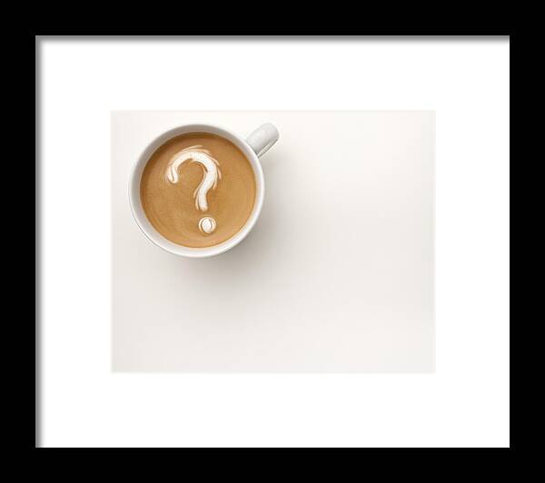 White Background Framed Print featuring the photograph A coffee with a question mark drawn in the foam by Anthony Bradshaw