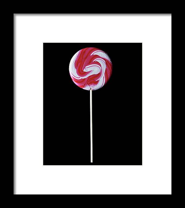 Cooking Framed Print featuring the photograph A Lollipop by Romulo Yanes