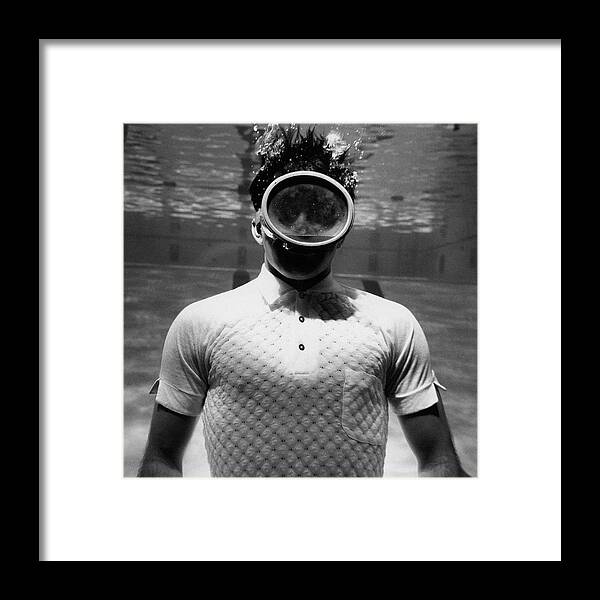 Model Framed Print featuring the photograph A Male Model Underwater In A Pool With A Scuba by Leonard Nones