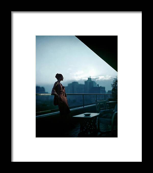 Fashion Framed Print featuring the photograph A Model Wearing A Clare Potter Dress At Moma by Constantin Joffe