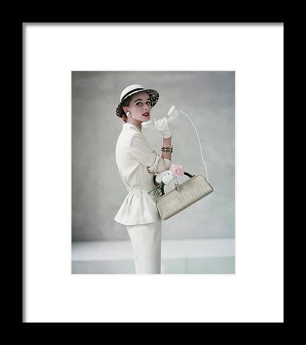 Fashion Framed Print featuring the photograph A Model Wearing A Handmacher Suit by Francesco Scavullo