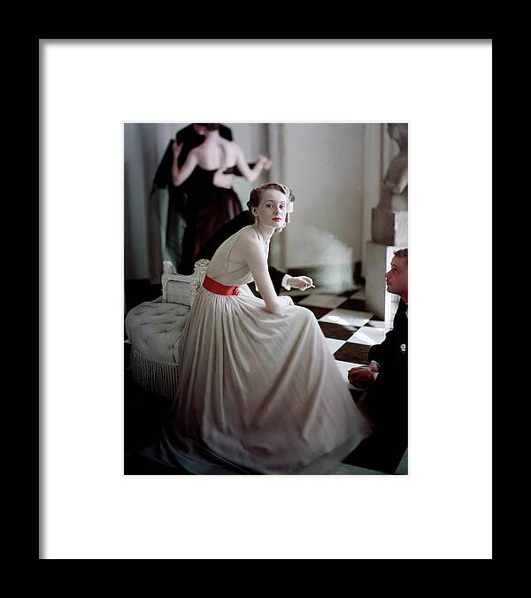 Beauty Framed Print featuring the photograph A Model Wearing A Harry Keiser Dress by Frances Mclaughlin-Gill