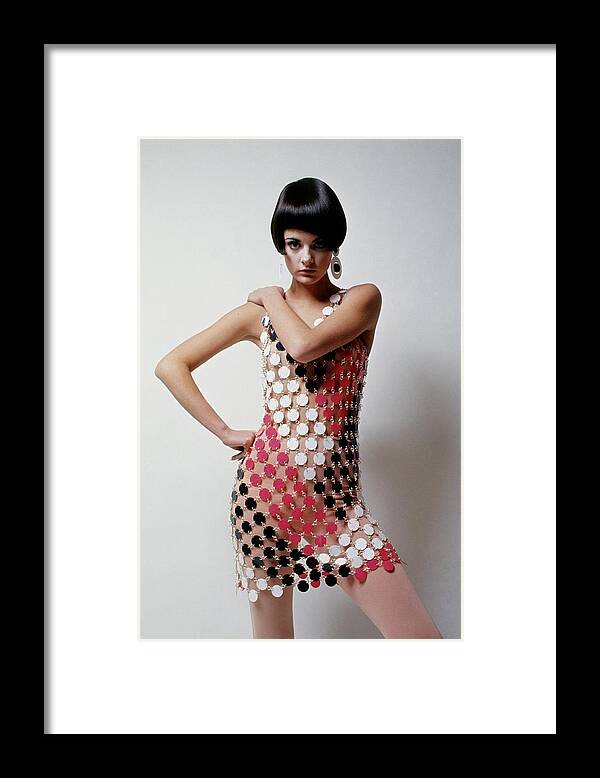 Fashion Framed Print featuring the photograph A Model Wearing A Mini Dress by David Mccabe
