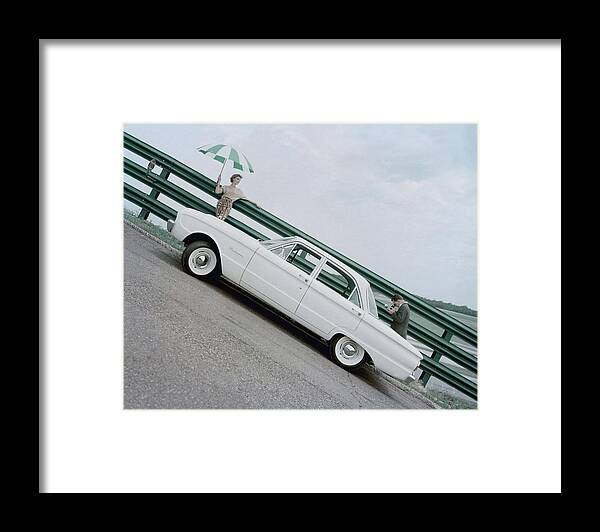 Fashion Framed Print featuring the photograph A Model With A Ford Falcon by John Rawlings