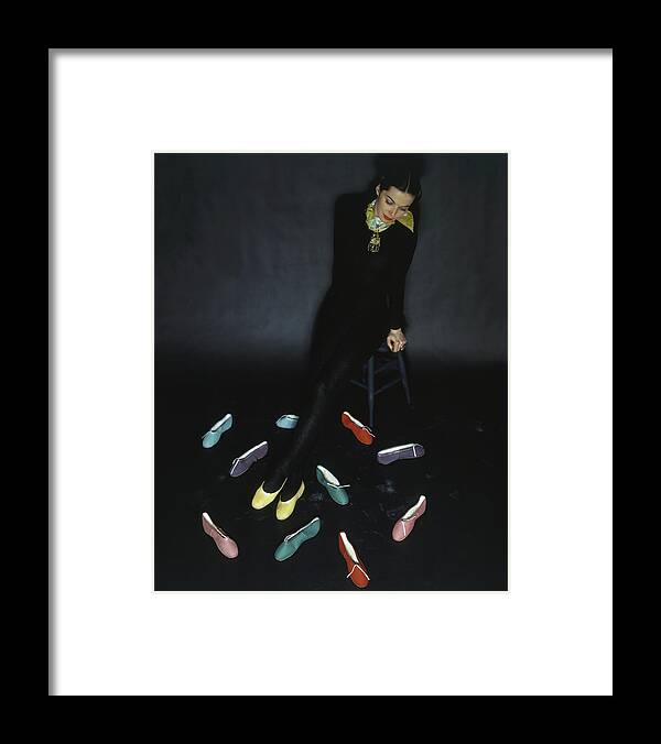 Fashion Framed Print featuring the photograph A Model With Footlights Ballet Slippers by John Rawlings