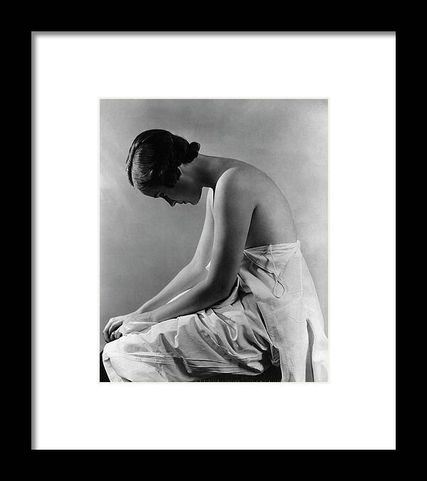Beauty Framed Print featuring the photograph A Model With Her Eyes Closed by Lusha Nelson
