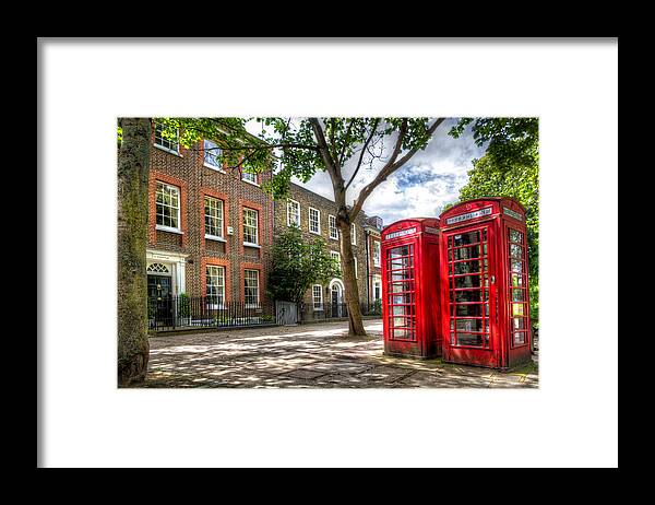 Europe Framed Print featuring the photograph A Pair of Red Phone Booths by Tim Stanley