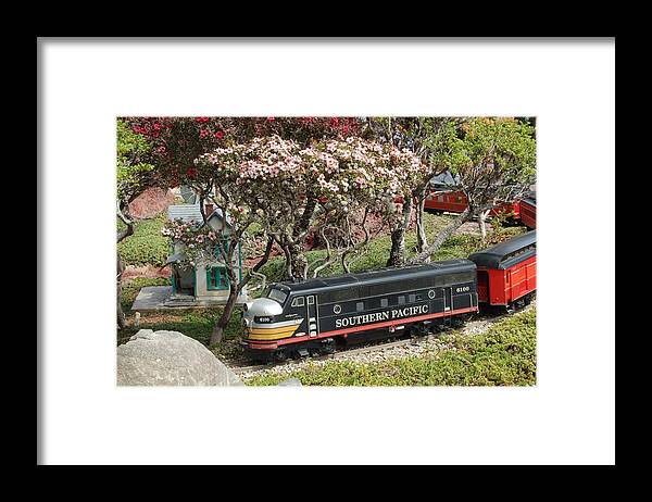 Linda Brody Framed Print featuring the photograph A Passenger Train Passes by Farm House by Linda Brody