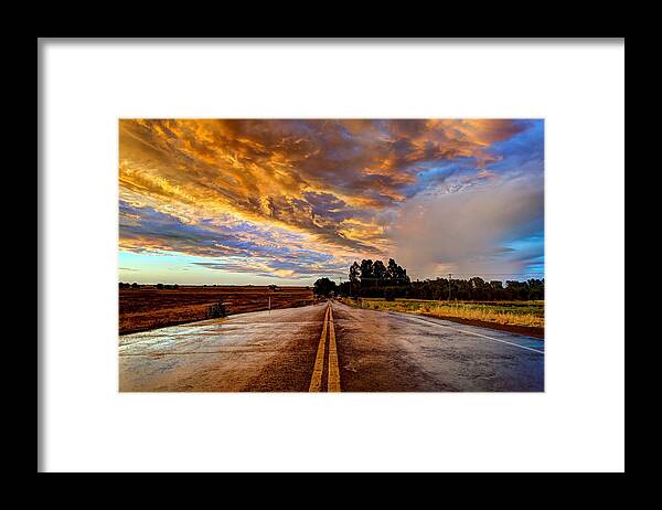 Sacramento Framed Print featuring the photograph A Passing Storm by Mike Ronnebeck
