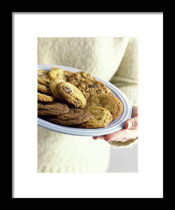 Cooking Framed Print featuring the photograph A Plate Of Cookies by Romulo Yanes