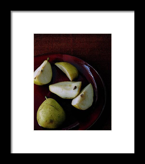 Pear Framed Print featuring the photograph A Plate Of Pears by Romulo Yanes