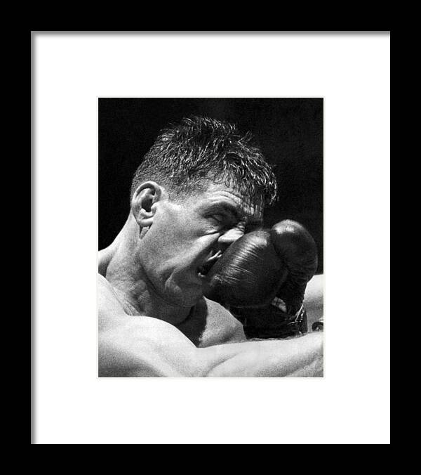 1953 Framed Print featuring the photograph A Punch In The Nose by Underwood Archives
