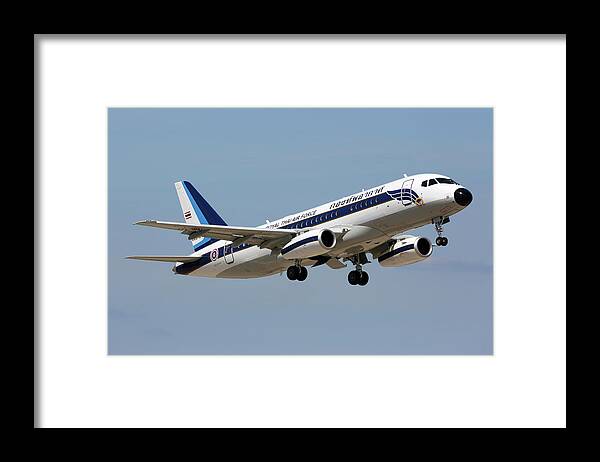 Aircraft Framed Print featuring the photograph A Superjet 100 Of The Royal Thai Air by Artyom Anikeev