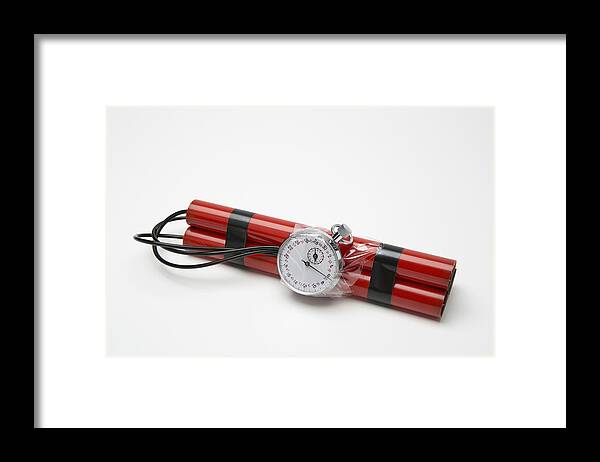 Problems Framed Print featuring the photograph A time bomb made with dynamite and a stopwatch by Caspar Benson