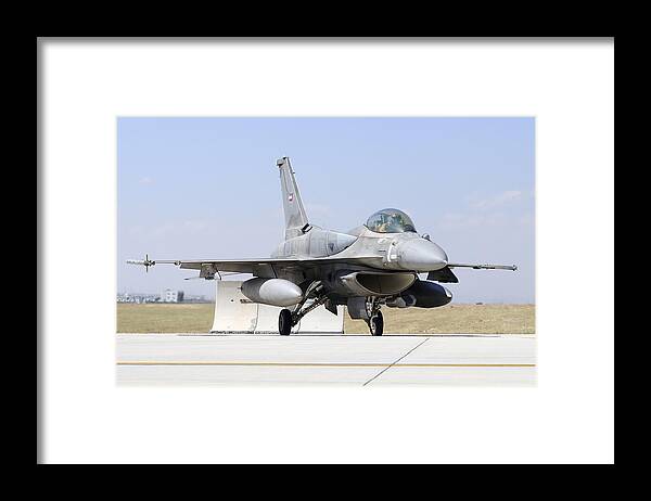 Military Framed Print featuring the photograph A United Arab Emirates Air Force F-16e by Daniele Faccioli