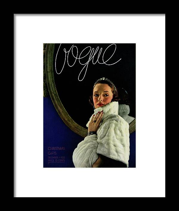 Fashion Framed Print featuring the photograph A Vogue Cover Of A Model Wearing A Cape And Muff by Edward Steichen