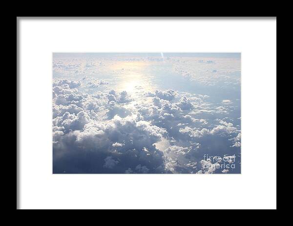 Clouds Framed Print featuring the photograph Above the clouds by Deena Withycombe