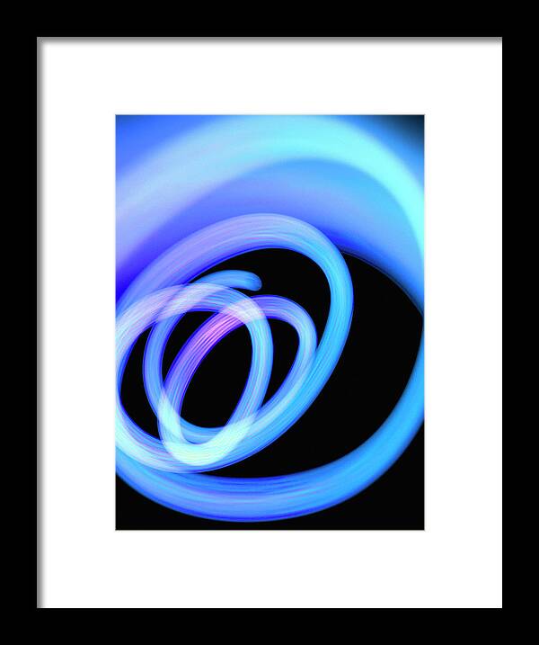 Black Background Framed Print featuring the photograph Abstract Spiral Of Blue Fiber Optic by Steven Puetzer