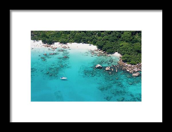 Sailboat Framed Print featuring the photograph Aerial Of Sailboat Off Anse Lazio by Holger Leue