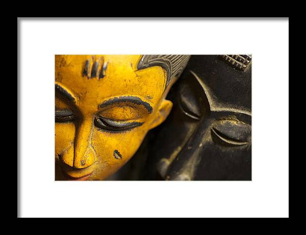 Abstract Framed Print featuring the photograph African Masks by Raul Rodriguez