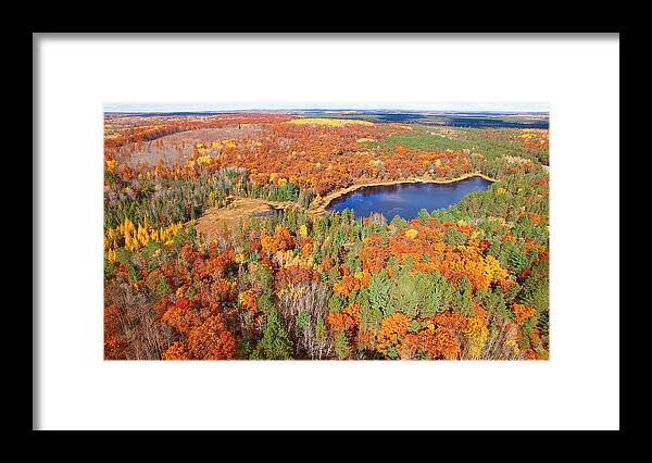 Scenics Framed Print featuring the photograph Amazing Autumn scenery, forests with lake, Fall colors, Aerial view by James Brey