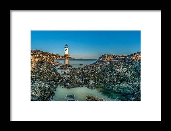 Lighthouse Framed Print featuring the photograph An early moon over Fort Pickering Light Salem MA by Bryan Xavier