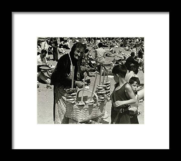 Cityscape Framed Print featuring the photograph An Elderly Woman Selling Food On The Beach by Lusha Nelson