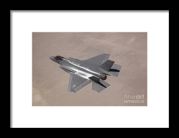 Horizontal Framed Print featuring the photograph An F-35 Lightning II Flies Over Edwards by Stocktrek Images