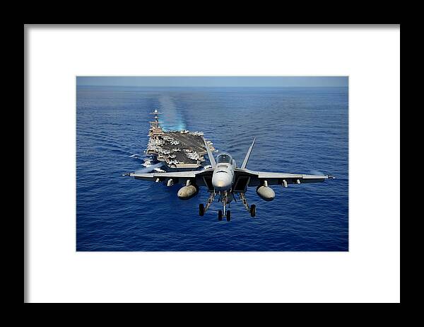 Chinfo Framed Print featuring the photograph An F/A-18 Hornet demonstrates air power. by Sebastian Musial