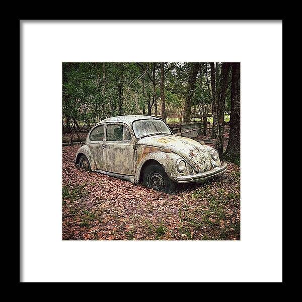 Centralflorida Framed Print featuring the photograph An Old Volkswagen Beetle In by Mike S