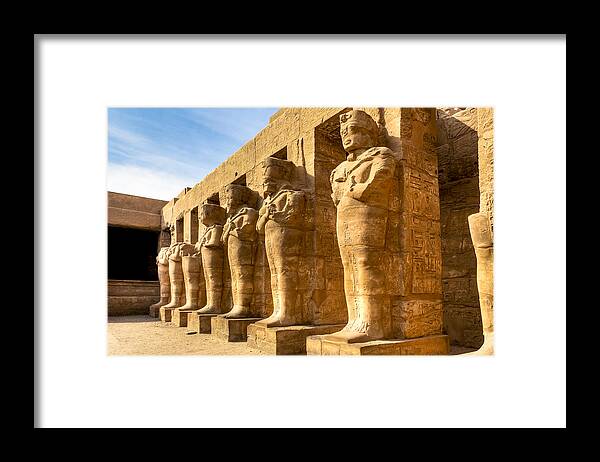 Egyptian Ruins Framed Print featuring the photograph Ancient Guardians at the Egyptian Ruins of Karnak by Mark Tisdale