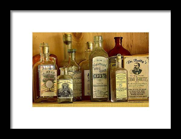 Antique Glass Bottles Framed Print featuring the photograph Antique General Store Display 2 by Kae Cheatham