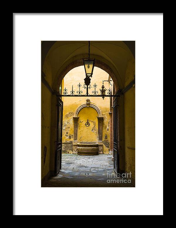 Europa Framed Print featuring the photograph Arched passage to well San Gimignano Italy by Peter Noyce