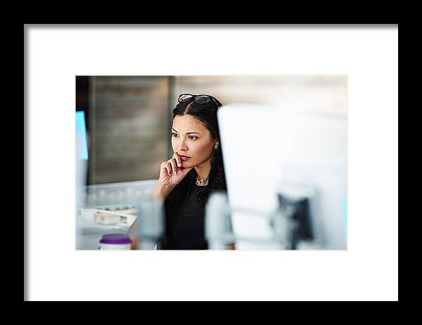 Expertise Framed Print featuring the photograph Architect at workstation contemplating the project by 10'000 Hours