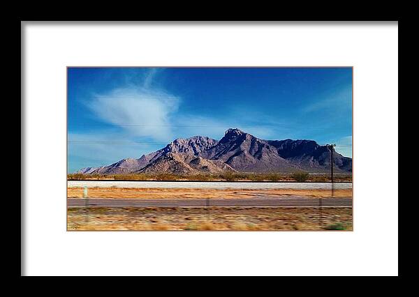 Arizona Framed Print featuring the photograph Arizona - On The Fly by Glenn McCarthy Art and Photography