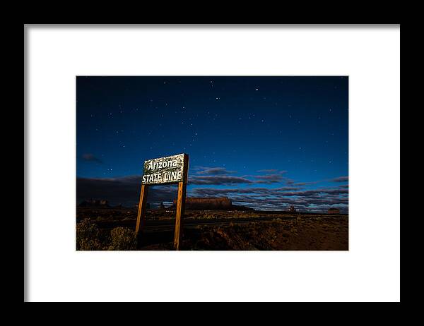Arizona Framed Print featuring the photograph Arizona State Line in Monument Valley at Night by Todd Aaron