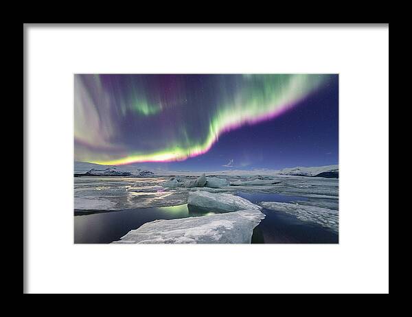 Glacier Lagoon Framed Print featuring the photograph Aurora Displays Over Jokulsarlon by Natapong Supalertsophon