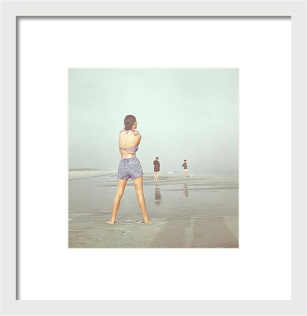 Back View Of Three People At A Beach by Serge Balkin