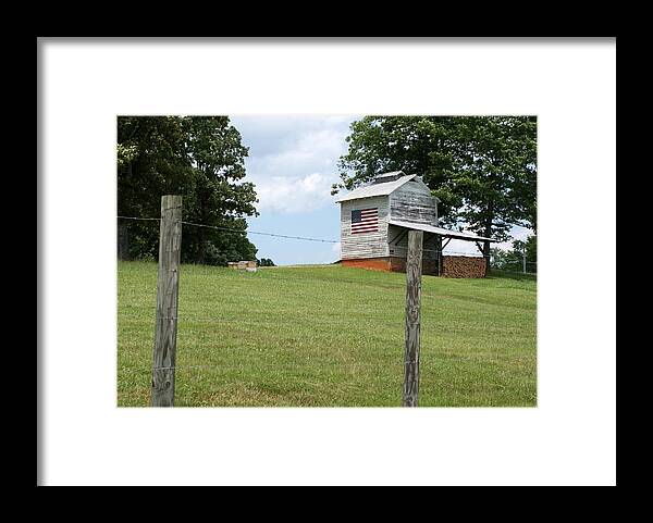 Barn Framed Print featuring the photograph Barn Displays Patriotism by Bill TALICH