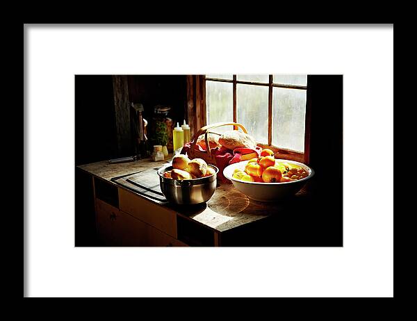 Temptation Framed Print featuring the photograph Basket Of Bread Pears And Tomatoes On by Thomas Barwick