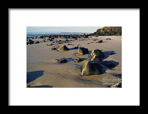 Sand Framed Print featuring the photograph Beach Stones I by Cassandra Buckley