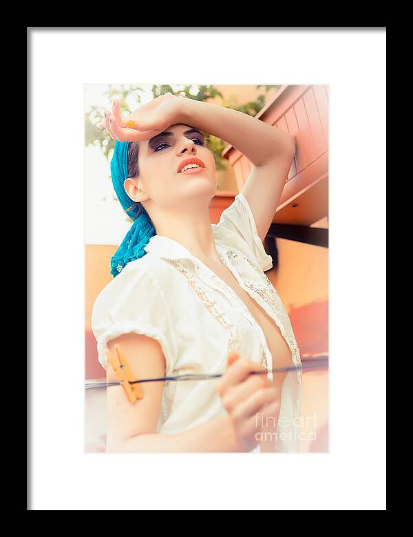 Woman Framed Print featuring the photograph Beautiful Young Woman Holding Arm Up With Washing Line by Joe Fox