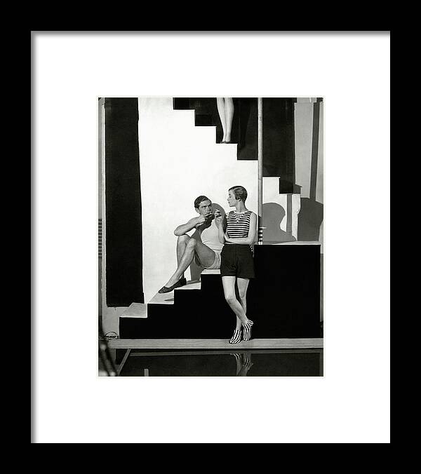 Accessories Framed Print featuring the photograph Bettina Jones Posing With A Male Model by George Hoyningen-Huene